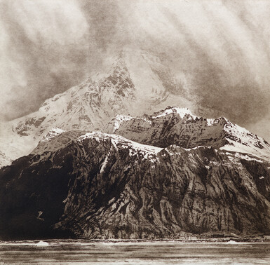 Monochromatic image of a mountain range with jagged, snow-capped peaks shrouded in a hazy, textured sky. The foreground depicts a body of water with subtle wave patterns. The artwork is characterized by high contrast and detailed textures, suggestive of a storm approaching the mountains.