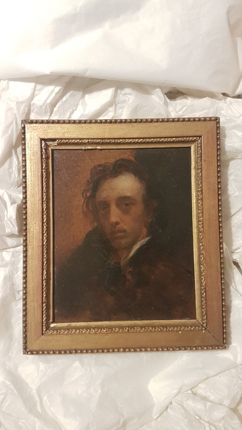 Gold framed portrait