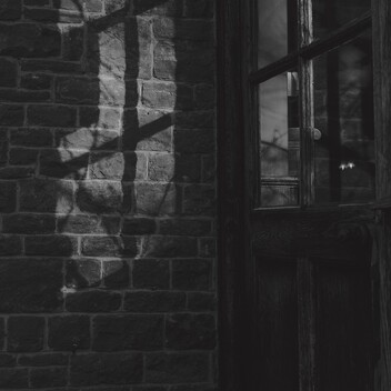 Dark shadowed image of a window