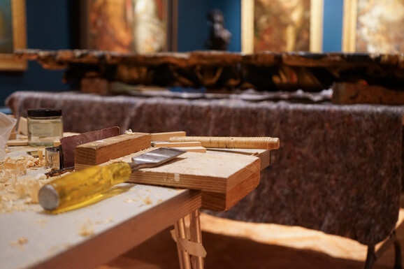 Close-up photo of carpenter tools and wood shavings in the Historic Galleries at Watts Gallery