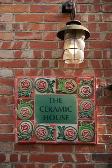 Photo of the name plaque for The Ceramic House