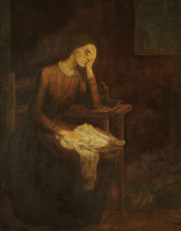 A woman in a red dress with one hand on her head sat in a chair in a dark room