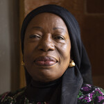 Magdalene smiles to camera