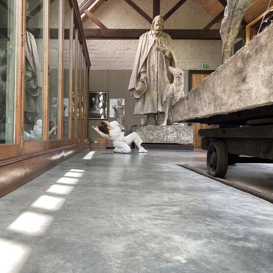 Dancer in a Sculpture Gallery