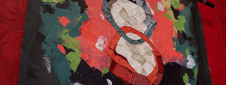 Photo inside the Historic Galleries at Watts Gallery. This is a close up image of an artwork hung on the wall which incorporates textiles and painting in a collage-style