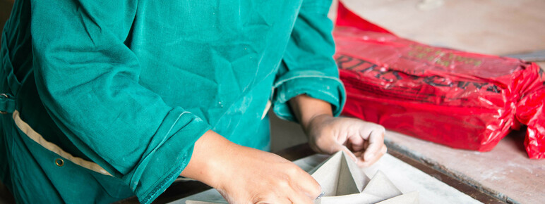 Halima Cassell working on an artwork