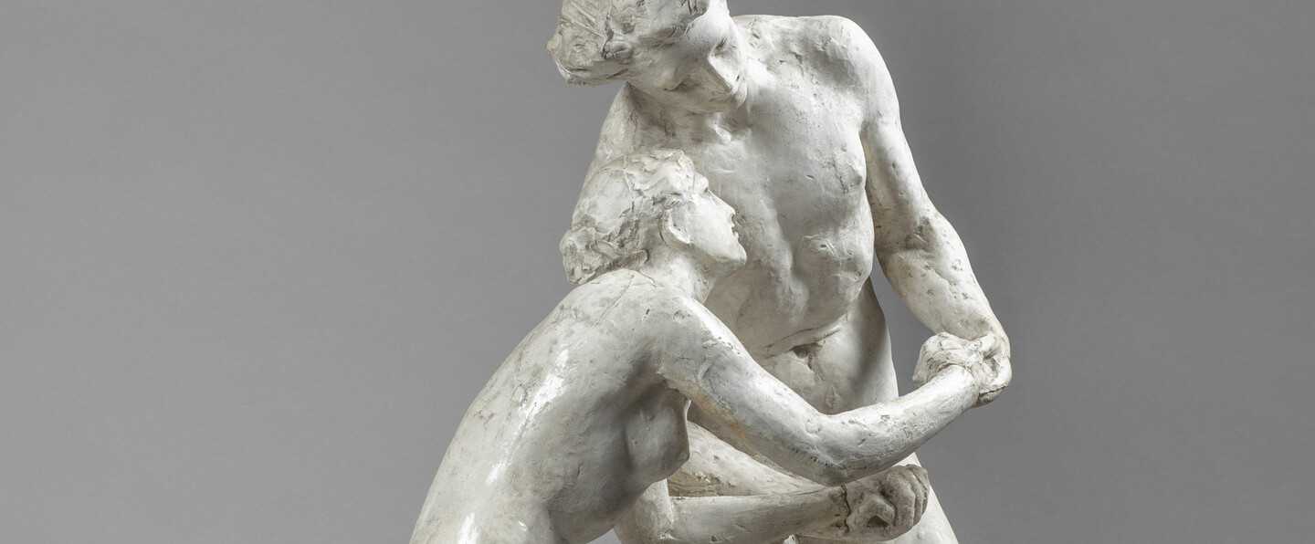 Photo of small sculpture of a nude man and woman