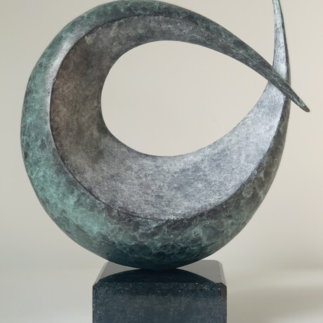 Bronze sculpture by Lucy Lutyens in a circular shape