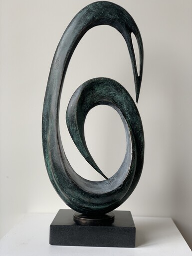 Bronze sculpture by Lucy Lutyens  of an oval shaped spiral