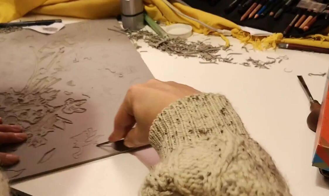 Lisa carving the lino for Carnations