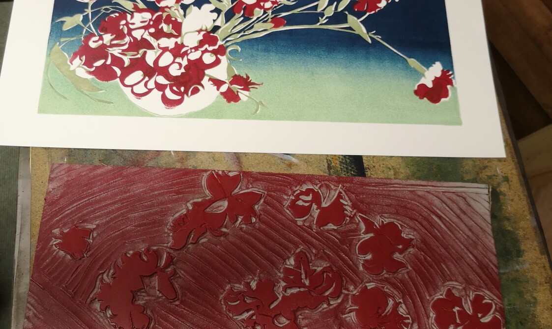 The red layer of Carnations and the linocut next to it