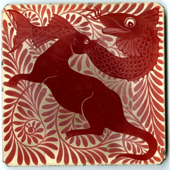 A red design of a stoat with a large fish in its jaws on a white tile