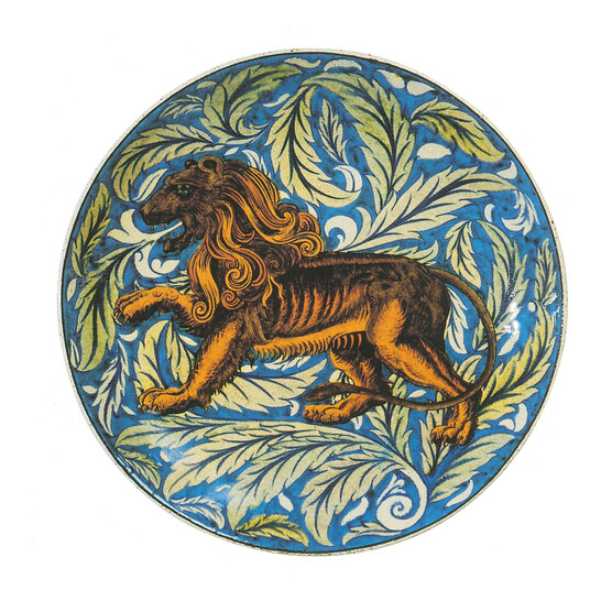 Shallow Earthenware dish. Decorated with a ferocious lion striding across a background of pale leaves on a turquoise ground.