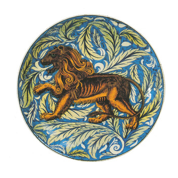 Shallow Earthenware dish. Decorated with a ferocious lion striding across a background of pale leaves on a turquoise ground.