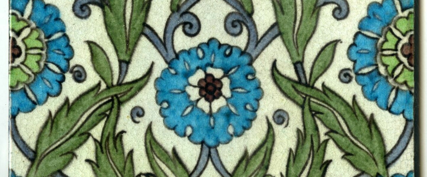8 inch tile with turquoise, manganese and green Iznik inspired floral pattern.