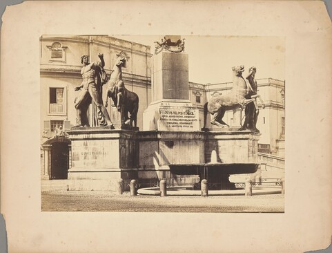 Statues of horse tamers surrounding a fountain