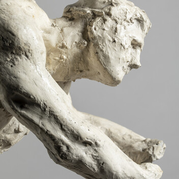 Plaster model side profile of man with arms outstretched