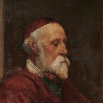 Watts in profile with his recognisable white beard, wearing the skullcap and robes