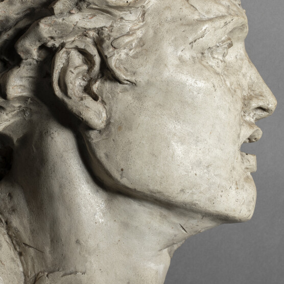 Side profile of a head, made in plaster