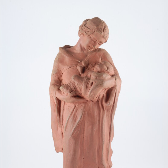 A terracotta figurine of Mary and Child