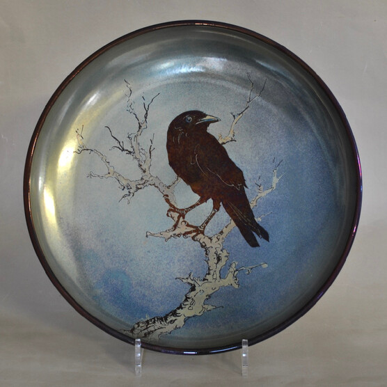 Blue lustreware plate with blackbird on a twig design