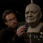 Jethro Crabb sculpting a clay head of Churchill.