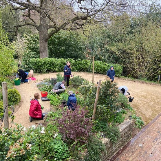 People tend to flower beds