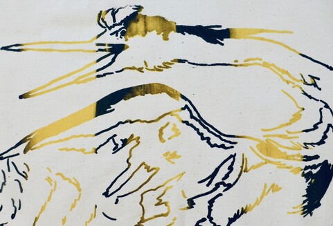 A yellow and black print of the Wounded Heron