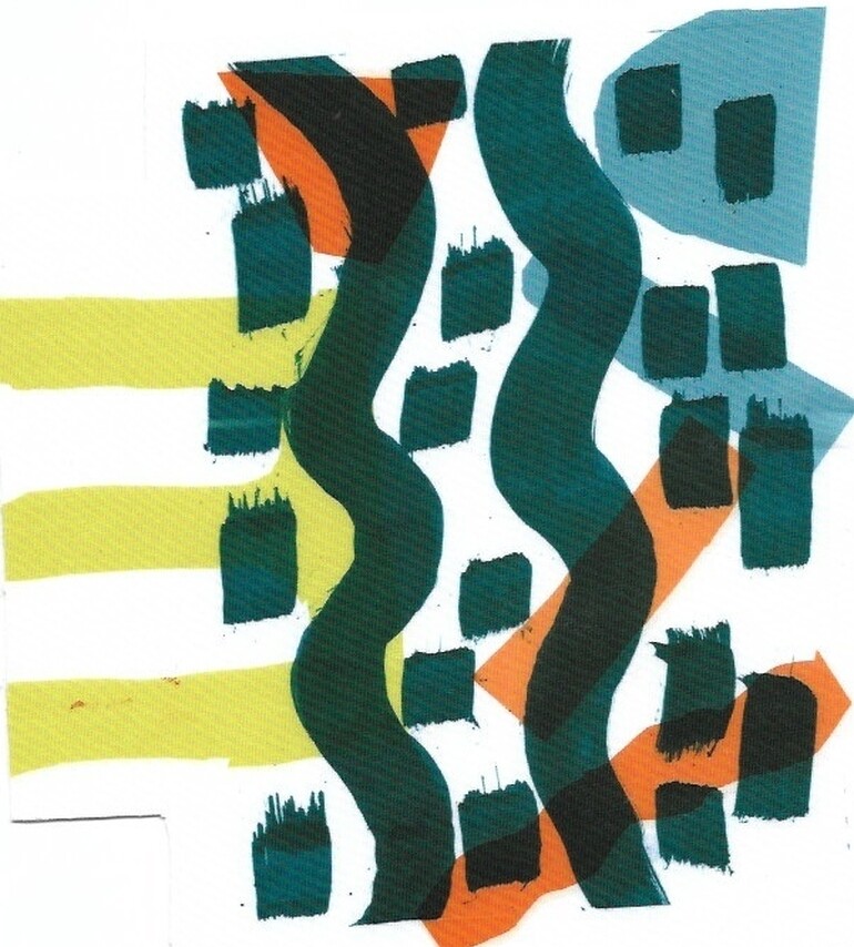 Multi-coloured block patterns printed on white paper