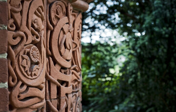 A close-up of terracotta details on chapel