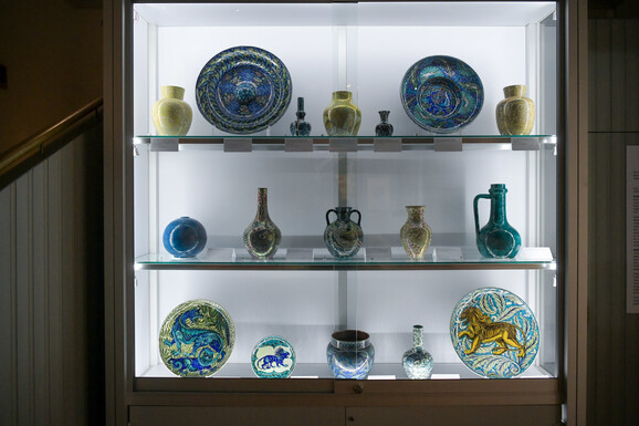 Ceramics on display in glass cabinet