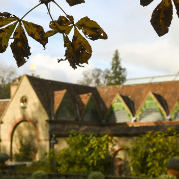 Watts Gallery with leaves in foreground