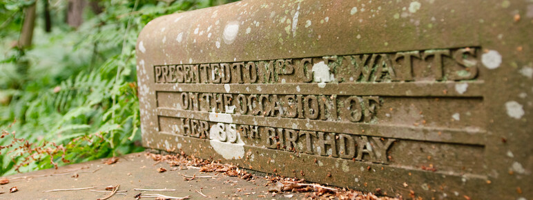 Stone bench with writing