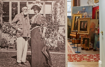A black and white photo on the wall, featured are two people outside a house