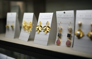 Earrings on a shelf