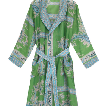 A long green gown with blue patterns and a waist tie