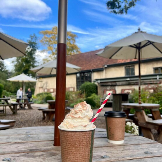 Two hot chocolate in takeaway cups