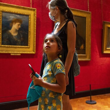 Mum and daughter look around gallery