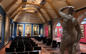 Historic Galleries set up with chairs for a private event