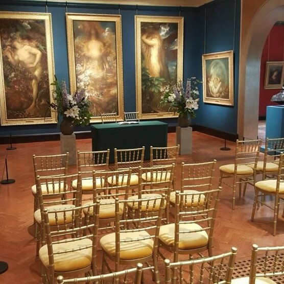 Wedding ceremony set up with table and chairs in rows